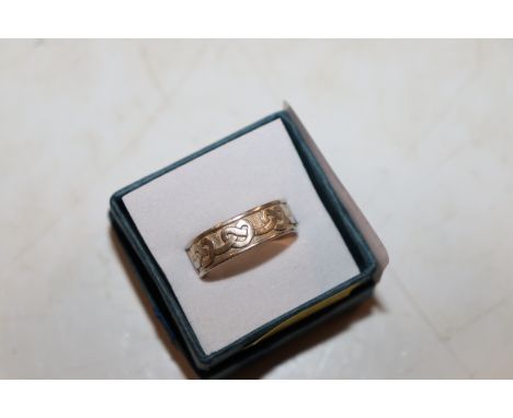 A Solid Sterling silver Celtic love knot band ring, ring size P/Q