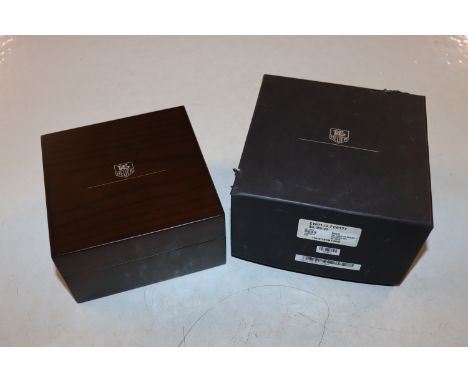 A Tag Heuer Monaco 69 watch box with booklet and card, and outer box 