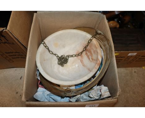 An alabaster hanging lamp