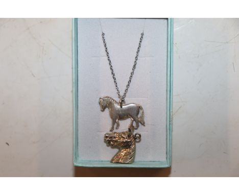 A vintage Hallmarked pony necklace and horse head charm