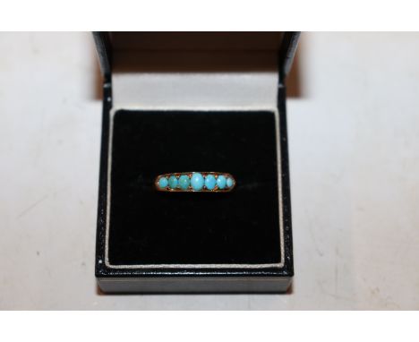 A yellow metal and turquoise set ring, 2.2g, ring size R/S
