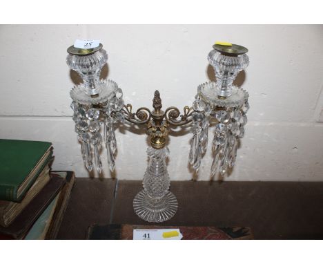 A Victorian cut glass two light candelabra, hung with faceted prism drops