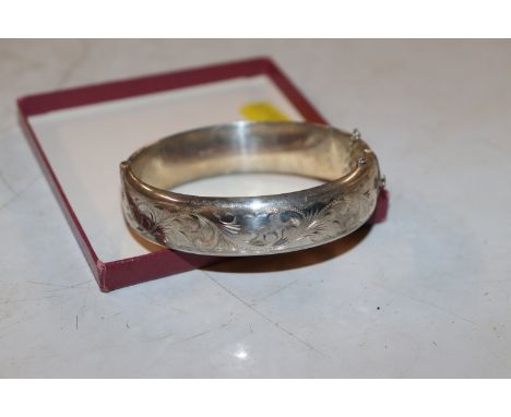 A 1975 Birmingham RPH Sterling silver bangle, 24.5gms  