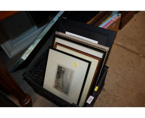 A box of assorted pictures and prints and a large cream framed mirror