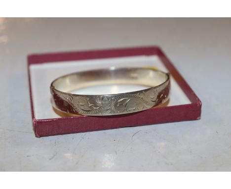 A 1978 Bracelon Ltd of Birmingham solid Sterling silver bangle, 23gms 