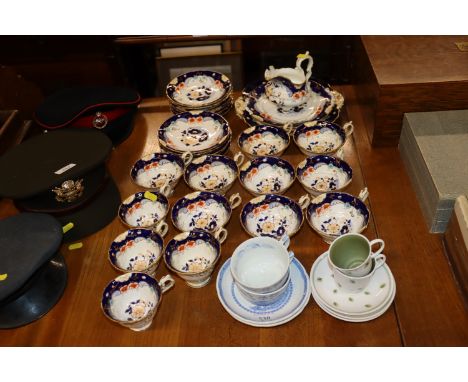 A collection of Victorian floral patterned tea ware, two Furnivals quail patterned cups and saucers and two Susie Cooper coff