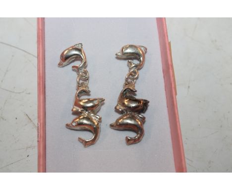 A pair of sterling silver earrings in the form of dolphins approx. total weight 10gm
