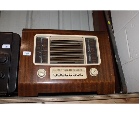 A walnut cased vintage radio