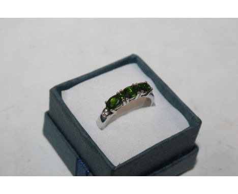 A sterling silver and diopside diamond set ring, ring size R/S