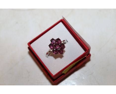 A Sterling silver pink tourmaline and diamond set dress ring, ring size Q