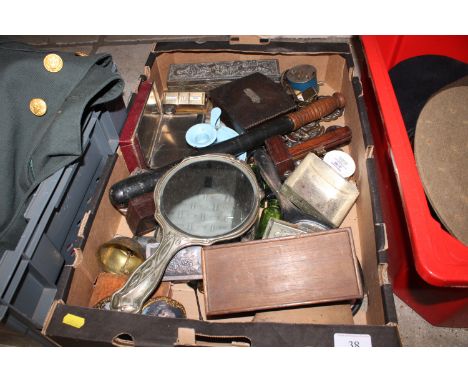 A box of miscellaneous items including plated hand mirror, truncheon, enamel chamber stick, desk calendar, oriental box etc