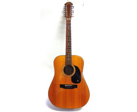 AN EPIPHONE MODEL FR212 12-STRING ACOUSTIC GUITAR  serial no. 060202, in a Stagg travel case.