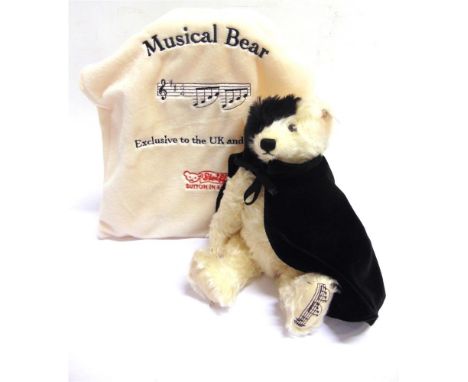 A STEIFF COLLECTOR'S TEDDY BEAR, 'MUSICAL BEAR 'PHANTOM OF THE OPERA''  (EAN 662164), white/black, with a key-wind musical mo