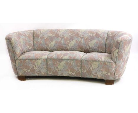 A Danish Art Deco 'banana-style' three-seater sofa, reupholstered in pastel floral fabric,175cm wide90cm deep72cm high, seat 