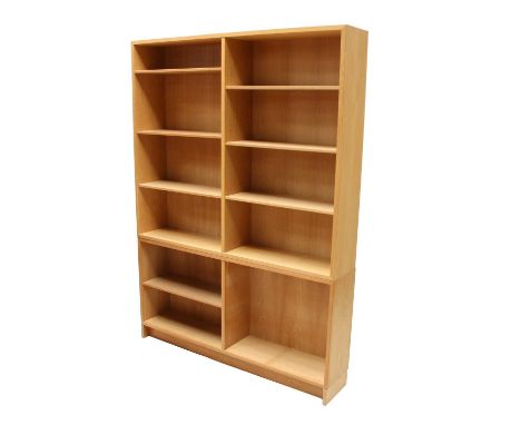 A Danish light oak two-part bookcase, labelled Karl Andersson &amp; Söner,135cm wide26cm deep187cm high