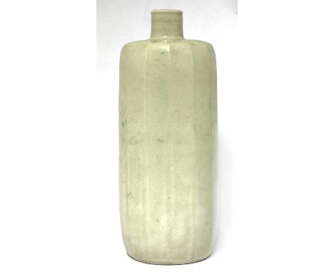 *William Marshall (1923-2007),a facet bottle vase, with a light celadon glaze, with green flecks, impressed artist's monogram