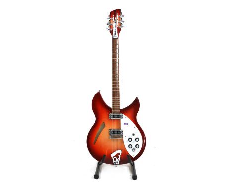 A 2010 Rickenbacker 330/12 Fireglo 12 string guitar, serial number 10 2***3, complete in original hardcase with a Levy suede 