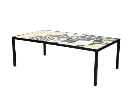 A Danish tile top coffee table,with an abstract design in buff, white, black and purple,135cm wide78cm deep45cm highCondition