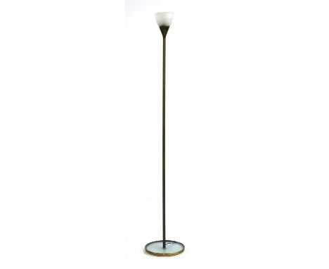 A brass standard lamp,1950s, designed by Max Ingrand for FontanaArte, with a frosted glass shade, on a glass-mounted plinth,1