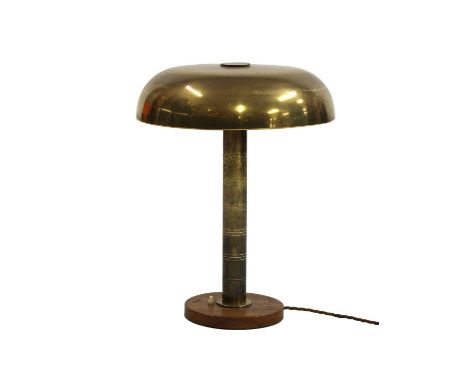 A Swedish brass table lamp,by Böhlmarks, similar to one designed by Harald Notini and Bertil Brisborg, on a wood plinth, fitt