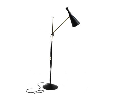 A floor lamp,1950s, designed by G A Scott for Maclamp, with a black shade,127cm highCondition report: Some minor knocks -tarn