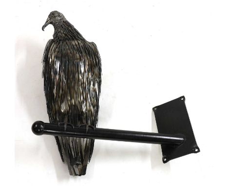 *David Athey (contemporary),a wrought iron model of an eagle, perched on a wall bracket,73cm wide82cm high*Artist's Resale Ri