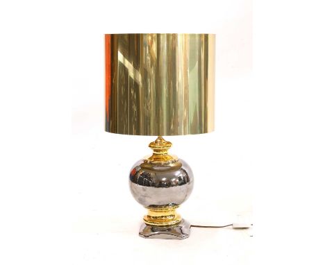 A Maison Charles two-tone table lamp,in gold and silver, with a gold shade,72cm high41cm diameterCondition report: Some wear,