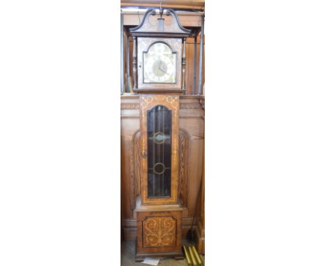 A reproduction three train longcase clock with Italian case and German movement, made in Norwich