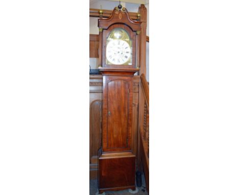 A Mahogany eight day longcase clock with silvered dial chapter ring and Brass spandrels by R. Simpson of Yarmouth
