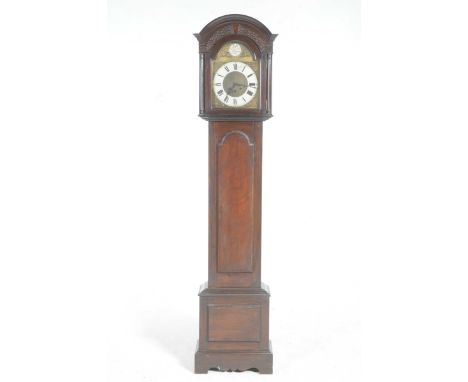 A reproduction mahogany long case clock,mid 20th CenturyWith an arched pediment above a blind fret work frieze and a gilt met