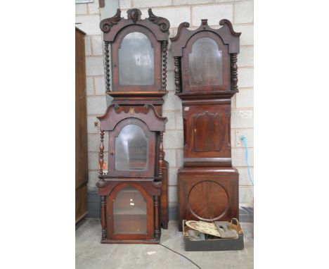 Two early 19th Century mahogany long case clock casesAlong with two further hoods and a break arch clock dial and movement wi