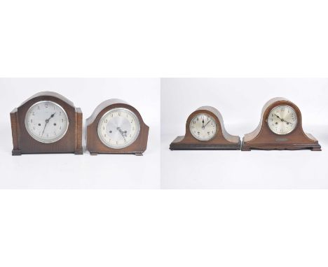A collection of approximately four wooden cased mantle clocks, early 20th Century First Napoleon hat shaped, 13cm dial with A