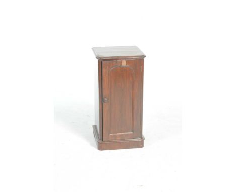 A Victorian rosewood pot cupboardWith a rectangular moulded top above single panelled door enclosing a single shelf raised up