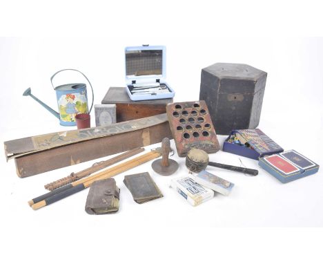 A collection of toys and games To include beat the drum, spring healed jack, diablo, accordion box, child's watering can, etc