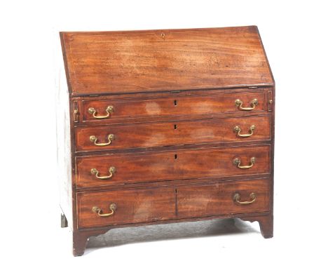 A George III mahogany bureauThe rectangular fall front enclosing a compartmentalized interior above four graduated cockbeaded