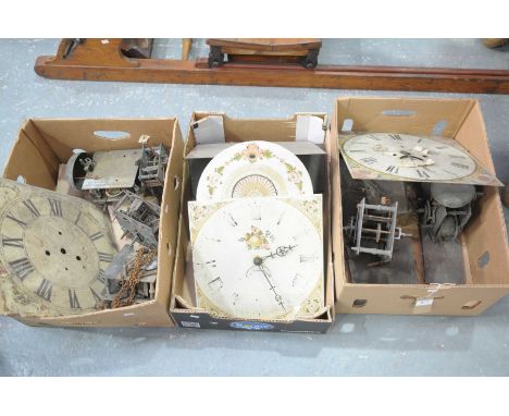 A collection of 18/19th Century long case clock dials and movementsTo include seven assorted movements, break arch and square