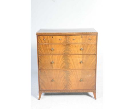 A Regency style mahogany chest of drawers, early 20th CenturyHaving a Greek key pattern frieze above an arrangement of two sh