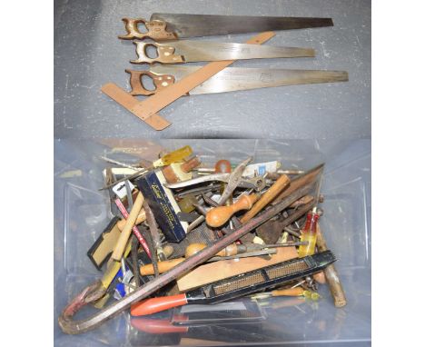 A collection of various vintage and contemporary tools To include wooden handled saws, hack saw blades, hammers, pliers, scre
