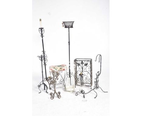 A collection of painted ironwork itemsTo include a wrought iron lamp standard, candelabra, wrought iron and upholstered stool