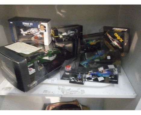 shelf of collectable die cast cars