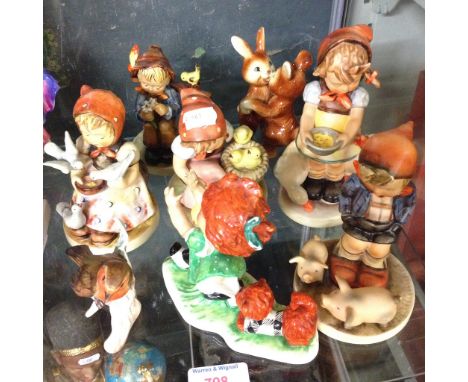 EIGHT GOEBEL AND HUMMEL FIGURES AND ANIMALS    C