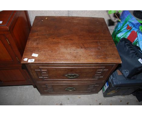 A commode, 25" x 21" x 2' high.