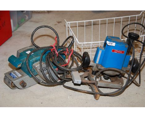 A Ryobi router and Makita sander.
