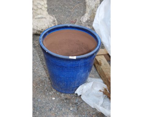 A blue glazed planter, 15 1/2'' diameter x 14'' high.