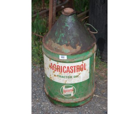 A drum of tractor oil (possibly 15/40 over 3 parts full).
