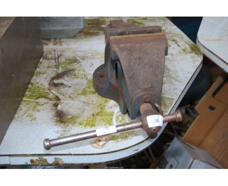 A 4 1/2'' bench vice with quick release slide action.