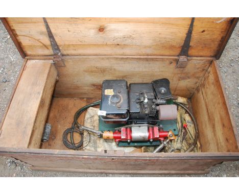 A wooden trunk and contents of a Lister Mounthill II model Briggs &amp; Stratton shearing kit, no head but two cables.