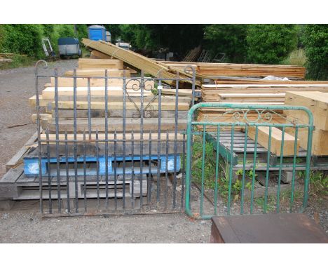 A wrought iron garden gate, 47'' wide x 45'' high and a tubular framed gate, 40'' wide x 36'' high.