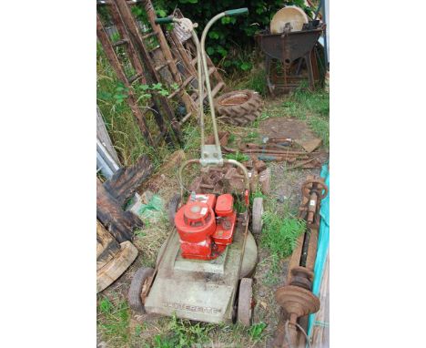 An old Hayterette lawn mower - engine turns.