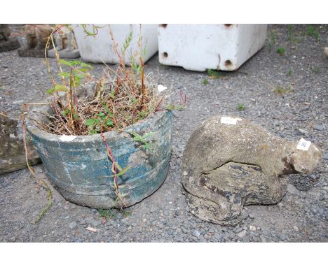 A round planter and an Otter.